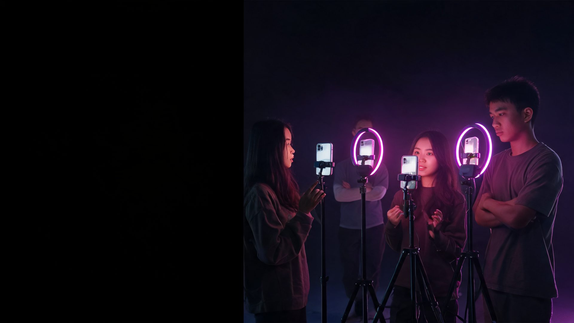 Trainee streamers practising in the AT SCAPE studio while a coach watches